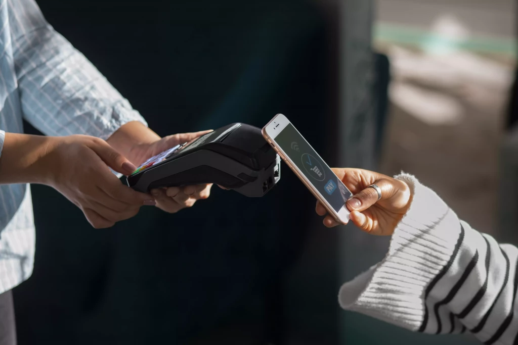 person-paying-with-nfc-technology-restaurant
